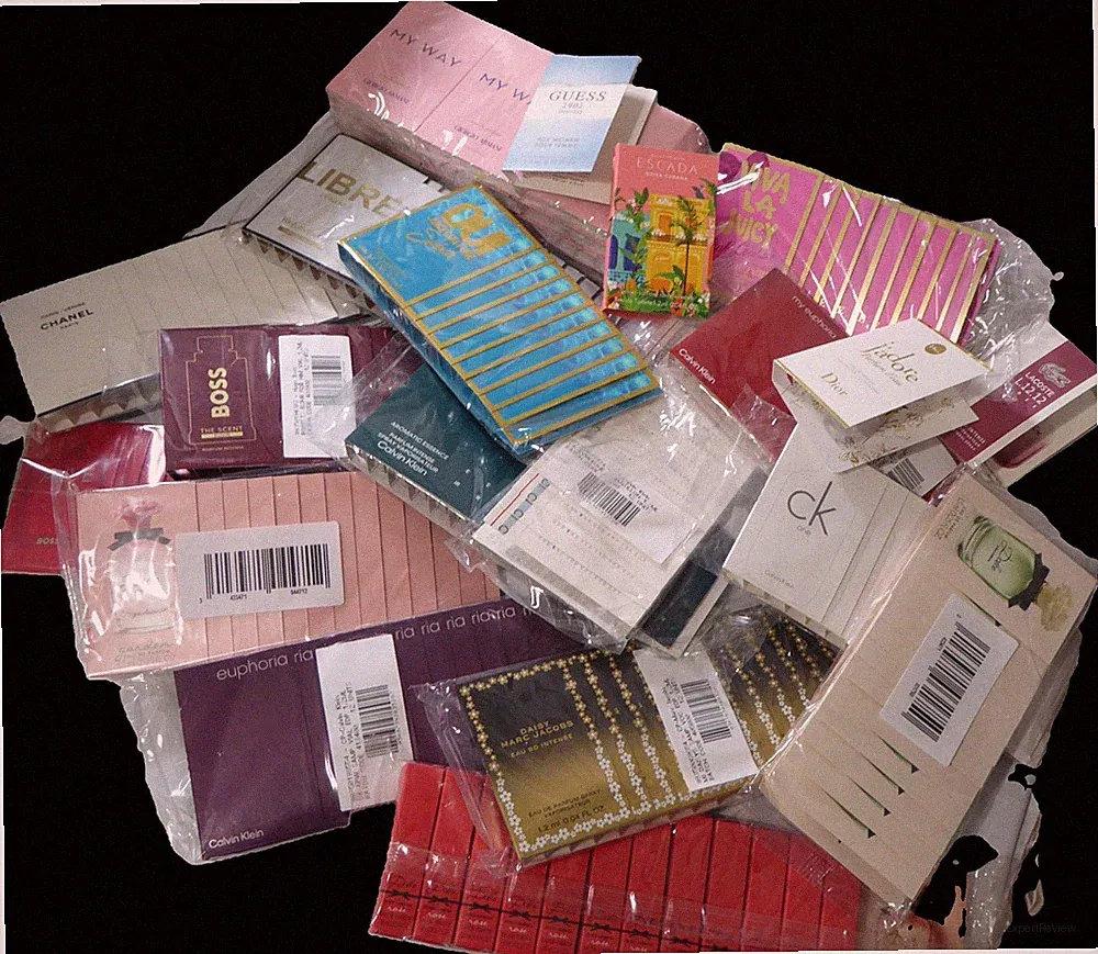100 DESIGNER PERFUMES#2 YOU GET 5 DIFFERENT SCENTS 20 EA .54 EA=100